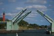 Bridges? How do I navigate under drawbridges or get the drawbridge to open?